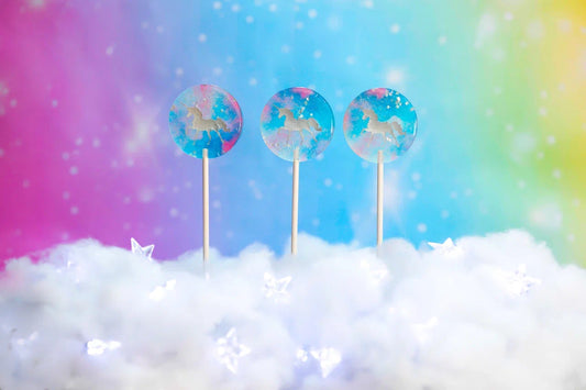 Clear isomalt unicorn lollipops with edible glitters, individually wrapped

Unicorn party favor lollipops, 2 inch with 6 inch sticks
